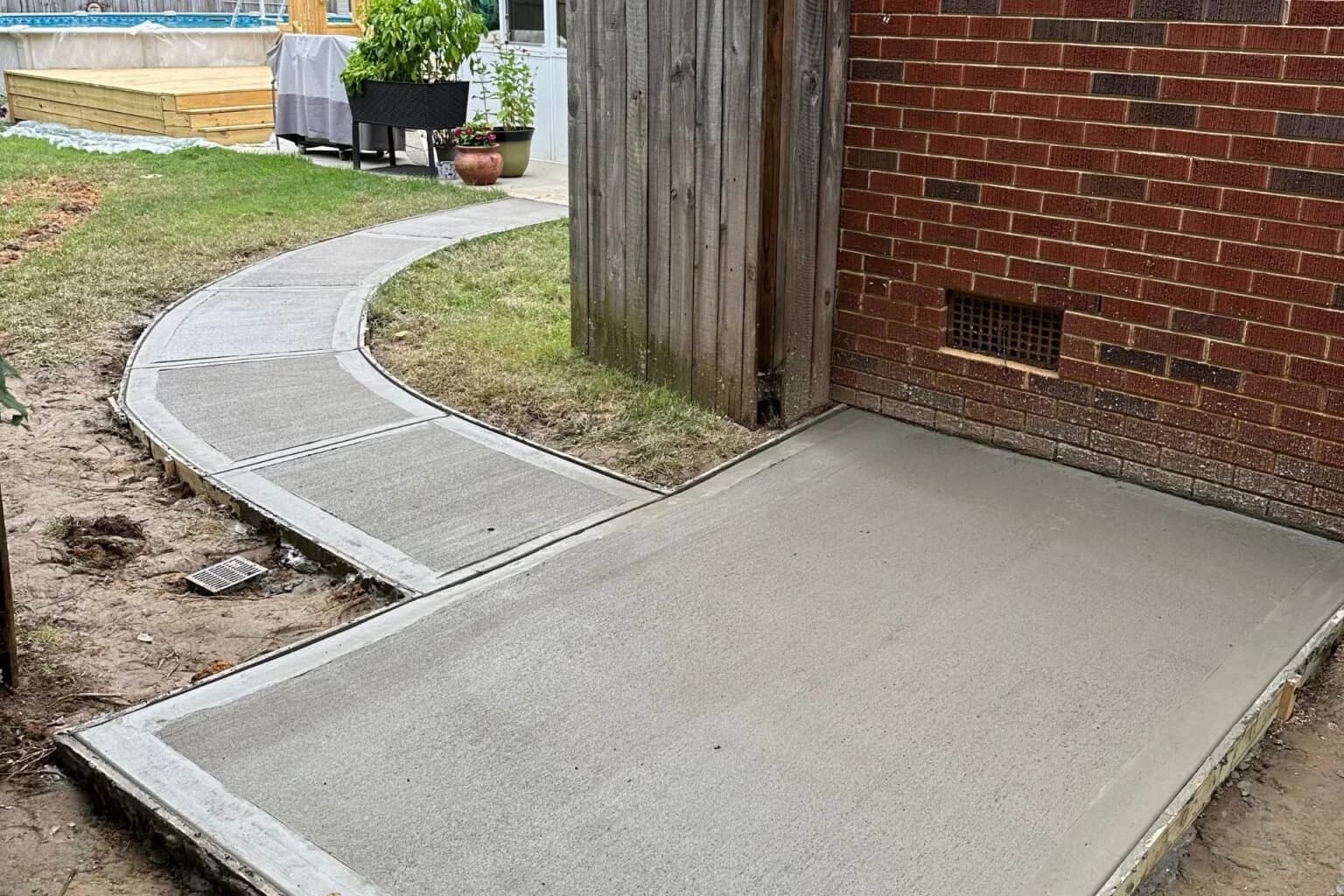 Curved concrete walkway built by Urban at the Elevated Pool Escape project in Charlotte