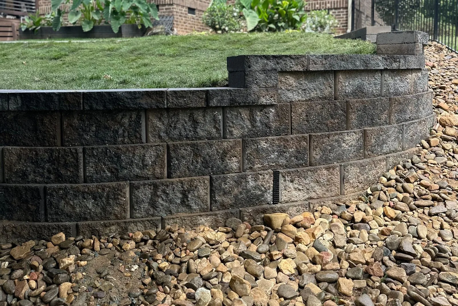 Retaining wall and finished planting area from Urban’s Backyard Escape project