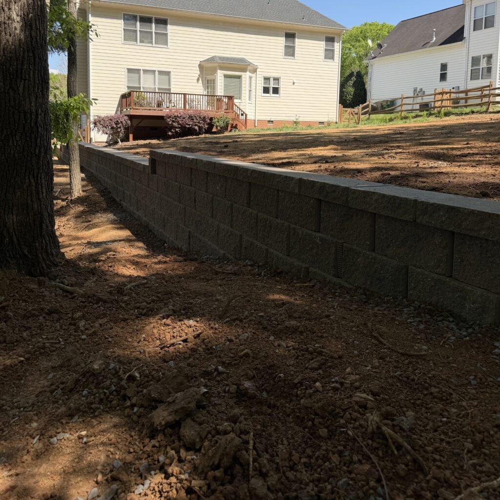 Finished retaining wall and graded upper yard at Ridgeline Restoration